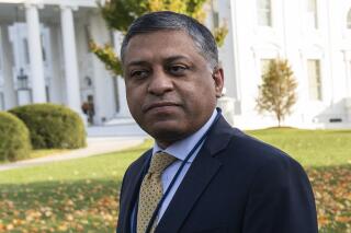 FILE - Dr. Rahul Gupta, the director of the White House Office of National Drug Control Policy, walks outside of the White House, Nov. 18, 2021, in Washington. The U.S. has named a veterinary tranquilizer as an “emerging threat” when it is mixed with the opioid fentanyl, clearing the way for more efforts to stop the spread of xylazine and develop an antidote. The Office of National Drug Control Policy announced the designation Wednesday, April 12, 2023. (AP Photo/Alex Brandon, File)