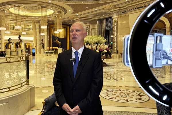 Kirill Dmitriev, the head of the Russian Direct Investment Fund, speaks to journalists at the Ritz Carlton hotel in Riyadh, Saudi Arabia, Tuesday, Feb. 18, 2025. (AP Photo/Baraa Anwer)