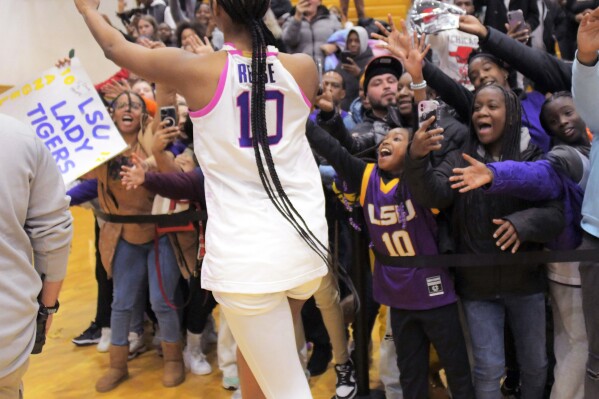 Fans react as LSU forward Angel Reese and her team leave after an NCAA college basketball game against the Coppin State, Wednesday, Dec. 20, 2023 in Baltimore. (Karl Merton Ferron/The Baltimore Sun via AP)
