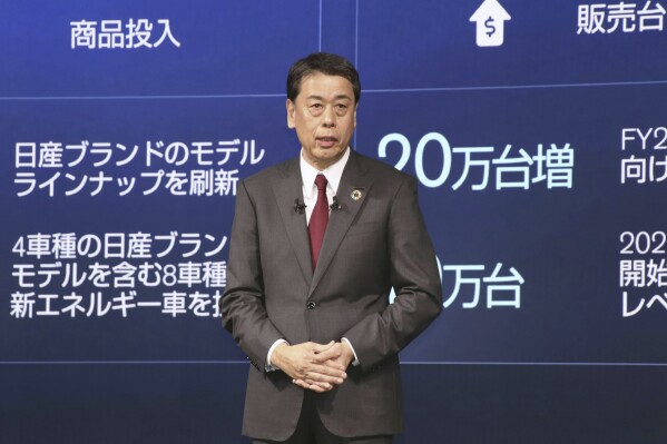 Nissan Chief Executive Makoto Uchida speaks during a press conference in Atsugi, near Tokyo, Monday, March 25, 2024. Nissan will expand its electric vehicle lineup, develop more powerful batteries, cut production costs, while speeding up the whole process, in what the Japanese automaker’s chief called “The Arc” pathway to greater sales by 2030.(Kyodo News via AP)