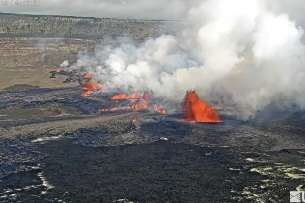 FILE -- This screen grab made on Sept. 10, 2023, from webcam video provided by the U.S. Geological Survey shows an eruption inside Hawaii Volcanoes National Park at the summit of Kilauea, one of the most active volcanoes in the world. A surge of earthquakes at Kilauea's summit prompted scientists to raise the alert level for the Hawaiian volcano on Wednesday, Jan. 31, 2024, but any eruption is unlikely to threaten homes. (U.S. Geological Survey via AP)