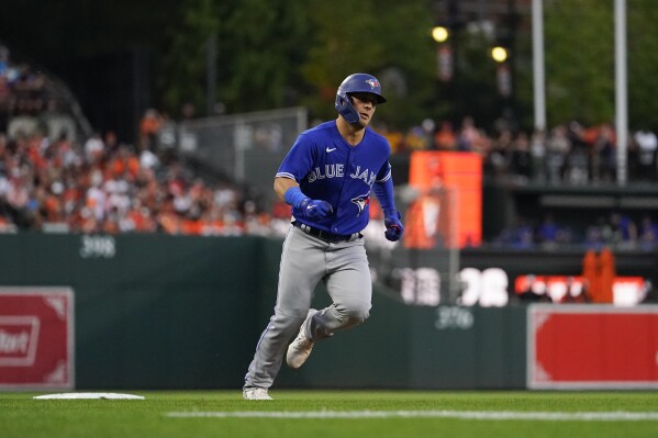 Brandon Belt's homer in the 10th innings lifts surging Blue Jays past  Orioles 6-3