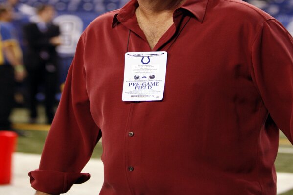 FILE - This Nov. 15, 2009 file photo shows conservative talk radio host Rush Limbaugh on the sideline before the start of an NFL football game between New England Patriots and Indianapolis Colts in...