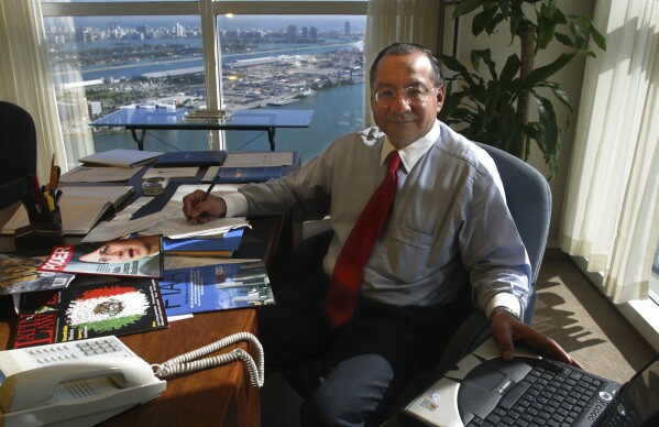 FILE - Manuel Rocha sits in his office at Steel Hector & Davis in Miami in January 2003, joining the firm to help open doors in Latin America. On Thursday, Feb. 29, 2024, Rocha, 73, told a judge he would admit to federal counts of conspiring to act as an agent of a foreign government, charges that could land him behind bars for several years. (Raul Rubiera/Miami Herald via AP, File)