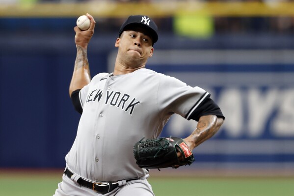 FILE -New York Yankees starting pitcher Frankie Montas throws to a Tampa Bay Rays batter during the first inning of a baseball game Sunday, Sept. 4, 2022, in St. Petersburg, Fla. Frankie Montas and the Cincinnati Reds have agreed to a $16 million, one-year contract, a person familiar with the negotiations told The Associated Press on Saturday, Dec. 30, 2023. (AP Photo/Scott Audette, File)