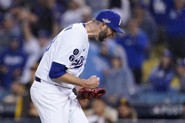 Los Angeles Dodgers relief pitcher Chris Martin reacts after San Diego Padres' Ha-Seong Kim flied out to end Game 1 of a baseball NL Division Series Tuesday, Oct. 11, 2022, in Los Angeles. (AP Photo/Marcio Jose Sanchez)