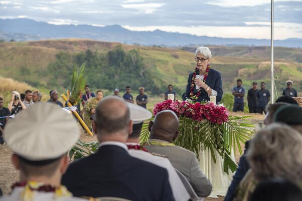 In this photo provided by the New Zealand Defence Force, U.S. Deputy Secretary of State Wendy Sherman speaks at a dawn service at Bloody Ridge as part of commemorations to mark the 80th anniversary of the Battle of Guadalcanal near Honiara, Solomon Islands, Monday, Aug. 8, 2022. A Japanese sailor was attacked during the World War II memorial service that was also attended by U.S. Deputy Secretary of State Wendy Sherman. (Petty Officer Chris Weissenborn/NZDF via AP)