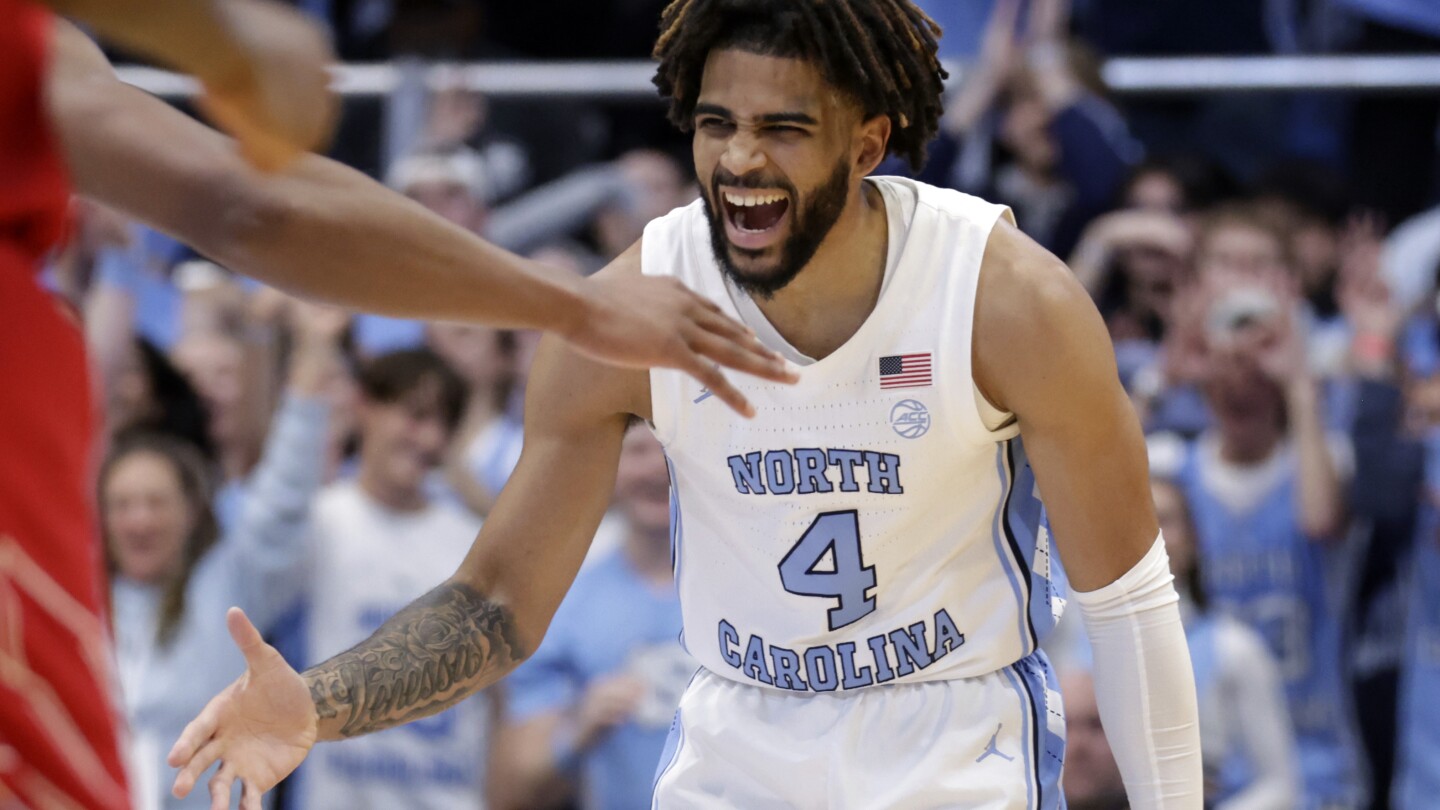 R.J. Davis scores 21 as No. 4 UNC beats Louisville 86-70 for 7th straight win