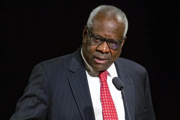 FILE - Supreme Court Justice Clarence Thomas speaks Sept. 16, 2021, at the University of Notre Dame in South Bend, Ind. Thomas has backed out of teaching a seminar at George Washington University's law school in the nation's capital, following student protests and the university's statement of support for the conservative justice's role on campus. (Robert Franklin/South Bend Tribune via AP, File)
