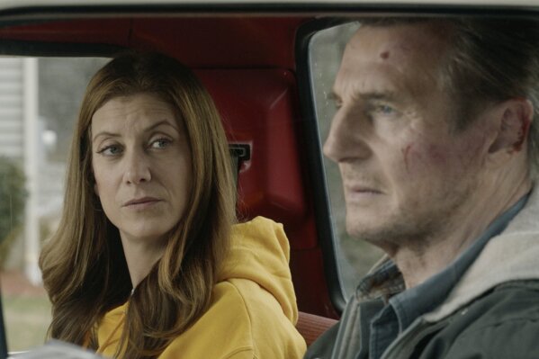 This image released by Open Road Films shows Kate Walsh, left, and Liam Neeson in a scene from "Honest Thief." (Open Road Films via AP)