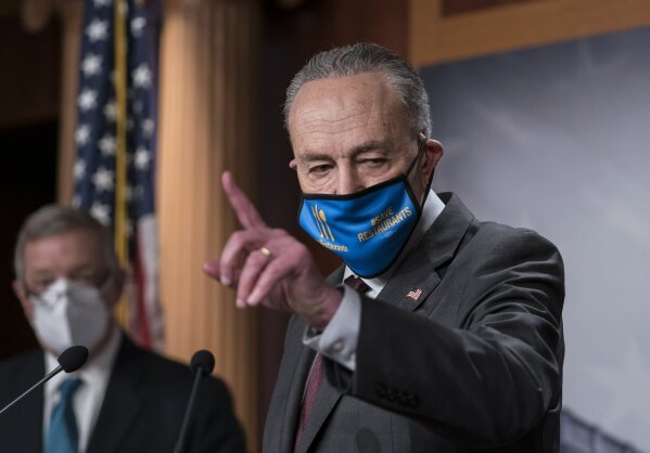 Senate Majority Leader Chuck Schumer, D-N.Y., and Majority Whip Dick Durbin, D-Ill., left, take questions from reporters about President Joe Biden's nominees, during a news conference at the Capitol in Washington, Tuesday, Feb. 23, 2021. (AP Photo/J. Scott Applewhite)