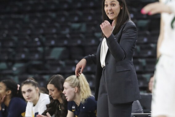 FILE - Canisius head coach Sahar Nusseibeh calls a play against Manhattan during the first half of an NCAA college basketball game in the quarterfinals of the Metro Atlantic Athletic Conference tournament at Jim Whelan Boardwalk Hall in Atlantic City, N.J., March 10, 2022. Eastern Michigan University hired Nusseibeh to take over as the Mid-American Conference school’s women’s basketball coach on Thursday, March 28, 2024. (Edward Lea/The Press of Atlantic City via AP, file)
