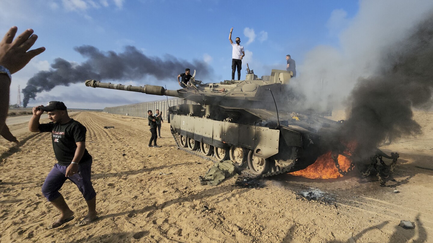 AP PHOTOS: Death, destruction and despair reigns a month into latest Israel-Gaza conflict