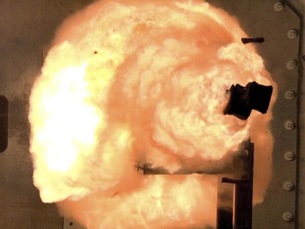 FILE - In this Thursday, Feb. 23, 2012, file photo provided by the US Navy, a high-speed camera image captures a full-energy shot by an electromagnetic railgun prototype launcher at a test facility in Dahlgren, Va. The Navy has pulled the plug on research on the futuristic weapon that fires projectiles at up to seven times the speed of sound using electricity. A Navy spokesperson says the decision frees up resources for hypersonic missiles, laser systems and electronic warfare systems. (U.S. Navy photo by John F. Williams via AP, File)