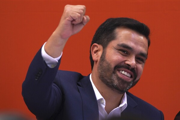 Rep. Jorge Álvarez Máynez greets supporters after he was nominated by the Citizen’s Movement party to run for president in the upcoming general elections, in Mexico City, Wednesday, Jan. 10, 2024. The 38-year-old congressman will face front-runner Claudia Sheinbaum of the ruling Morena party, and opposition coalition candidate Xochitl Gálvez on June 2. (AP Photo/Fernando Llano)