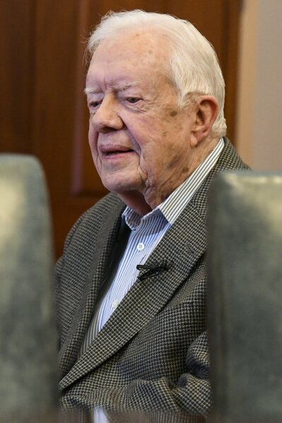 
              Former President Jimmy Carter, 93, sits for an interview about his new book "Faith: A Journey For All" which will debut at no. 7 on the New York Times best sellers list, pictured before a book signing Wednesday, April 11, 2018, in Atlanta. (AP Photo/John Amis)
            