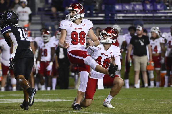 FILE - Miami (Ohio) place kicker Graham Nicholson watches after kicking the game-winning field goal as Alec Bevelhimer holds the ball against Northwestern during the second half of an NCAA college football game, Sept. 24, 2022, in Evanston, Ill. Former All-American Nicholson, who won the award as the nation's top placekicker last season, announced on social media Sunday, April 21, 2024, his plans to transfer to Alabama. (AP Photo/Matt Marton, File)