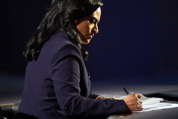 Moderator Kristen Welker of NBC News takes notes during the second and final presidential debate Thursday, Oct. 22, 2020, at Belmont University in Nashville, Tenn. (AP Photo/Julio Cortez)