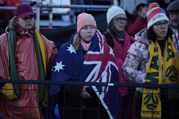 People attend the "Spirit of Place" ceremony and dawn memorial service at the Anzac Cove beach, the site of the April 25, 1915, World War I landing of the ANZAC (Australian and New Zealand Army Corps) on the Gallipoli peninsula, near Canakkale, Turkey, early Friday, April 25, 2025. (AP Photo/Emrah Gurel)