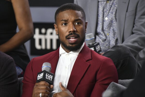 FILE - In this Sept. 7, 2019 file photo, Michael B. Jordan attends a press conference for "Just Mercy" during the Toronto International Film Festival. As protests erupted across the country following the death of George Floyd, every major entertainment company in Hollywood issued statements of support for the black community. But as unanimous as that show of solidarity was, it was also clear that this wasn't a fight Hollywood could watch from the sidelines. At a recent protest in Los Angeles organized by major talent agencies, Jordan said, “Where is the challenge to commit to black hiring? Black content led by black executives, black consultants." (Photo by Evan Agostini/Invision/AP, File)