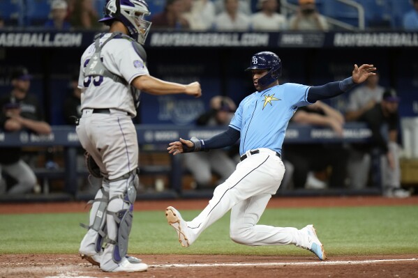 Osleivis Basabe's first major league homer is a grand slam as the Rays beat  the Rockies 12-4