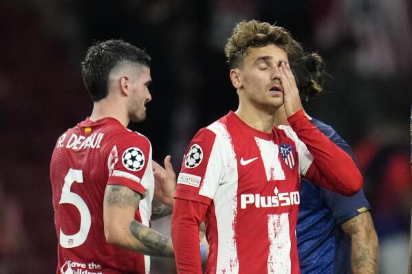 Atletico Madrid's Antoine Griezmann wipes his eyes at the and of the Champions League Group B soccer match between Atletico Madrid and Porto at Wanda Metropolitano stadium in Madrid, Spain, Wednesday, Sept. 15, 2021. (AP Photo/Manu Fernandez)