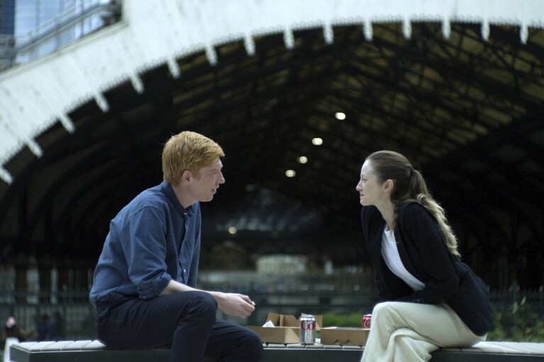 This image released by PBS shows Domhnall Gleeson, left, and Andrea Riseborough in a scene from MASTERPIECE "Alice & Jack," premiering Sunday March 17 on PBS. (Fremantle/PBS via AP)
