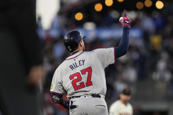 Braves 3B Austin Riley leaves game after being hit by pitch on right hand |  AP News