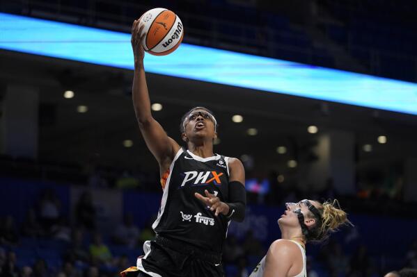 FILE - Phoenix Mercury guard Diamond DeShields shoots next to Dallas Wings guard Marina Mabrey during the second half of a WNBA basketball game, June 17, 2022, in Arlington, Texas. DeShields will be chronicling her journey with USA Basketball as they prep for and play in the FIBA World Cup in Australia. (AP Photo/Tony Gutierrez, File)