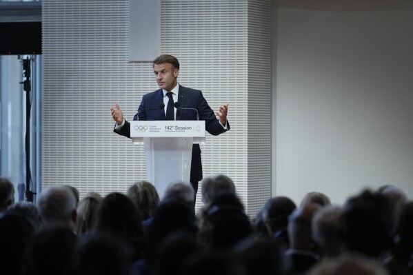 French President Emmanuel Macron speaks, during the IOC Session Opening Ceremony at the Louis Vuitton Foundation ahead of the 2024 Summer Olympics, Monday, July 22, 2024, in Paris, France. (ĢӰԺ Photo/Thibault Camus)