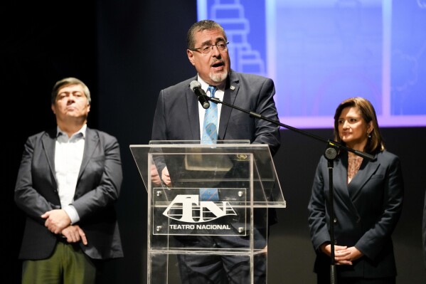 Guatemalan President-elect Bernardo Arévalo gives a press conference with his ministerial cabinet at the Miguel Angel Asturias Cultural Center in Guatemala City, Monday, Jan. 8, 2024. Arévalo will take office on Jan. 14. (AP Photo/Moises Castillo)
