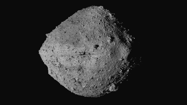 This undated image made available by NASA shows the asteroid Bennu from the OSIRIS-REx spacecraft. After almost two years circling the ancient asteroid, OSIRIS-REx will attempt to descend to the treacherous, boulder-packed surface and snatch a handful of rubble on Tuesday, Oct. 20, 2020. (NASA/Goddard/University of Arizona/CSA/York/MDA via AP)