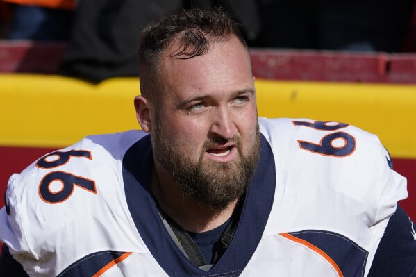 FILE - Denver Broncos guard Dalton Risner warms up prior to a game against the Kansas City Chiefs during an NFL football game Sunday, Jan. 1, 2023, in Kansas City, Mo. The Minnesota Vikings signed former Denver guard Dalton Risner on Tuesday, Sept. 19, 2023, to try to shore up what has been a problematic position for several seasons. (AP Photo/Ed Zurga, File)