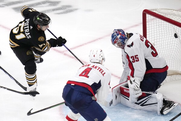 Rookie Bedard scores, but Pastrnak pots 2 to lead Bruins past Blackhawks  3-1, National