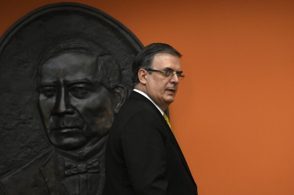 Mexican ​Foreign Minister Marcelo Ebrard arrives for a news conference at the Embassy of Mexico in Washington, Tuesday, Sept. 10, 2019. (AP Photo/Susan Walsh)