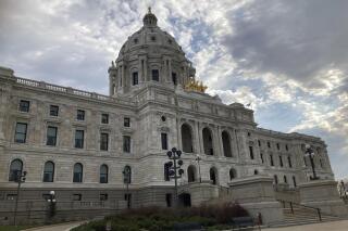 The Minnesota State Capitol is shown on Friday, March 5, 2023, in St. Paul, Minn., as the Legislature negotiates the big budget bills of the session with only two full weeks left before the adjournment deadline of Monday, May 22. (AP Photo/Steve Karnowski)