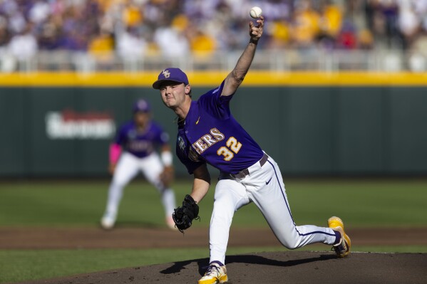 LSU starting pitcher Kade Anderson (32) throws against Coastal Carolina in the first inning of Game 1 of the NCAA College World Series baseball finals in Omaha, Neb., Saturday, June 21, 2025. (AP Photo/Rebecca S. Gratz)