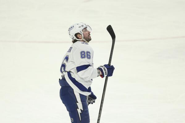 Tampa Bay Lightning right wing Nikita Kucherov (86) looks up at the scoreboard after scoring during the third period of an NHL hockey game against the Buffalo Sabres on Tuesday, Jan. 11, 2022, in Buffalo, N.Y. (AP Photo/Joshua Bessex)