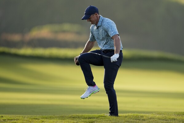 Rory McIlroy reacts after his shot from the rough on the 14th hole during the third round of the U.S. Open golf tournament at Los Angeles Country Club on Saturday, June 17, 2023, in Los Angeles. (AP Photo/George Walker IV)