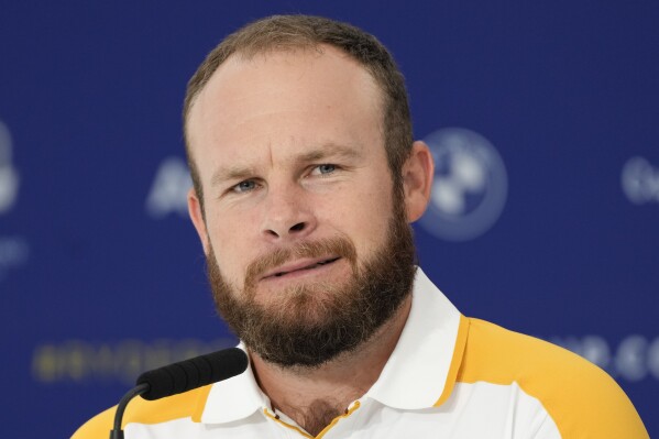 Europe's Tyrrell Hatton meets the journalists during a press conference ahead of the Ryder Cup at the Marco Simone Golf Club in Guidonia Montecelio, Italy, Wednesday, Sept. 27, 2023. The Ryder Cup starts Sept. 29, at the Marco Simone Golf Club. (AP Photo/Gregorio Borgia)