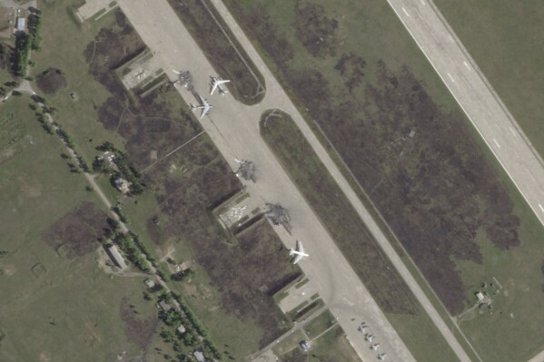 This satellite image from Planet Labs PBC shows damage after a Ukrainian drone attack targeted the Belaya Air Base in the Irkutsk region of eastern Siberia in Russia on Wednesday, June 4, 2025. (Planet Labs PBC via AP)