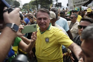 Lawmaker son of Brazil's Bolsonaro announces relocation to the US as father  faces legal woes | AP News