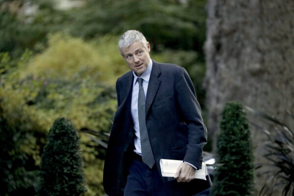 FILE.- Britain's Minister of State for Environment and International Development Zac Goldsmith arrives for a cabinet meeting at 10 Downing Street in London, Tuesday, Oct. 22, 2019. A British environment minister who is close to former Prime Minister Boris Johnson has quit and accused the current government of apathy towards climate issues. Zac Goldsmith said Friday, June 30, 2023 that he could no longer do his job because Prime Minister Rishi Sunak is “simply uninterested” in the environment. (AP Photo/Matt Dunham, file)