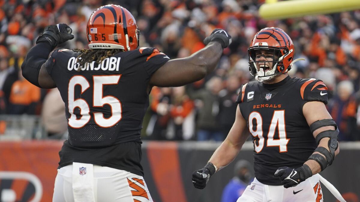 Cincinnati Bengals wide receiver Ja'Marr Chase (1) tries to hold onto a  pass during an NFL Wild-Card Playoff football game against the Las Vegas  Raiders, Saturday, Jan. 15, 2022. The Bengals defeated