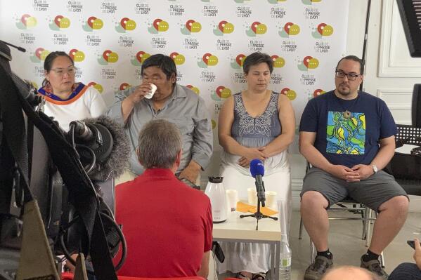 From the left, Inuit delegation members Aliku Kotierk, Jesse Tungilik , Tanya Tungilik and Steve Mapsalak attend a press conference in Lyon, central France, Thursday, Sept.15, 2022. A priest accused of sexually abusing dozens of Inuit children when he missioned in their Canadian Arctic community has told alleged victims and relatives who traveled to France to confront him that he won't go back to Canada to be questioned. (AP Photo/Nicolas Vaux-Montagny)