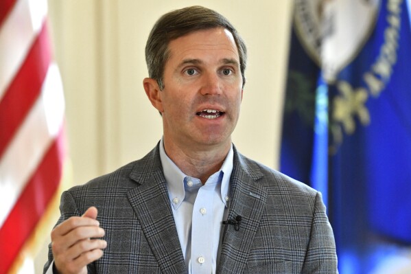 Kentucky Gov. Andy Beshear speaks during an interview at the Kentucky State Capitol in Frankfort, Ky., Monday, July 22, 2024. (AP Photo/Timothy D. Easley)