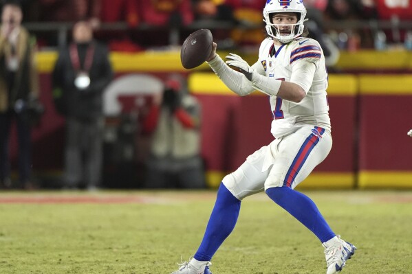 Buffalo Bills quarterback Josh Allen looks to pass during the second half of the AFC Championship NFL football game against the Kansas City Chiefs, Monday, Jan. 27, 2025, in Kansas City, Mo. (AP Photo/Charlie Riedel, File)