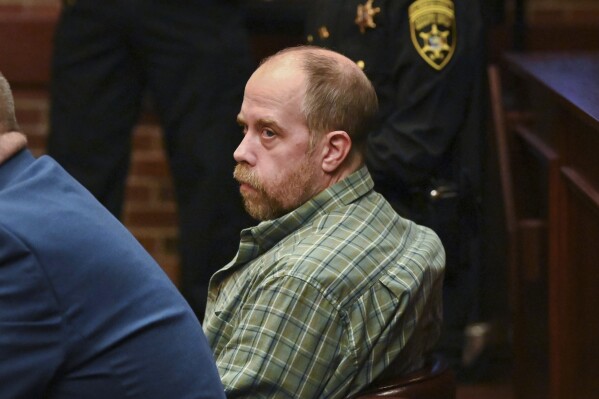 Craig N. Ross, Jr. is arraigned before Judge James A. Murphy III on charges related to the kidnapping of a 9-year-old from Moreau Lake State Park Friday, Nov. 17, 2023, at Saratoga County Court in Ballston Spa, N.Y. Ross, who is accused of kidnapping the young girl as she rode her bicycle in a wooded upstate New York park was charged Friday with sexually assaulting her. Ross pleaded not guilty in court. (Will Waldron/The Albany Times Union via AP)