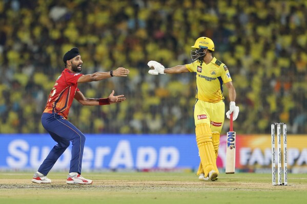 Punjab Kings' Harpreet Brar, left, appeals successfully for the wicket of Chennai Super Kings' Shivam Dube during the Indian Premier League cricket match between Chennai Super Kings and Punjab Kings in Chennai, India, Wednesday, May 1, 2024. (AP Photo/R. Parthibhan)