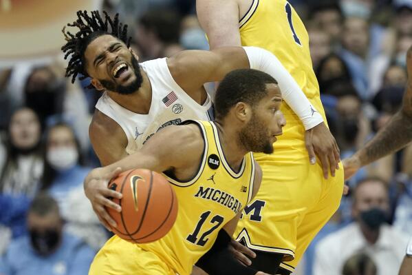 Physical altercation sparks scoring run, propels UNC men's basketball past  Michigan 